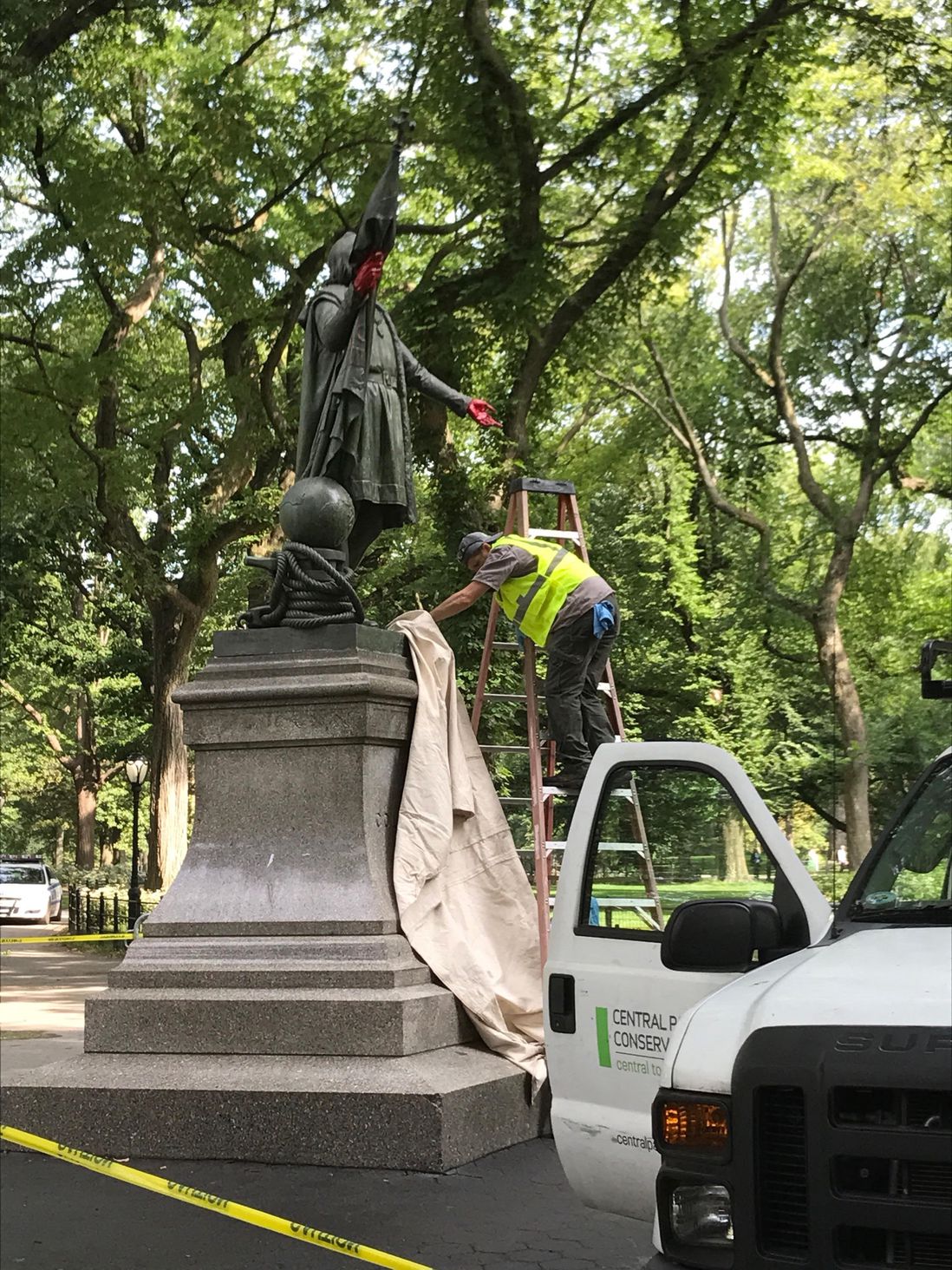 The statue is now being covered (Danielle Barnes / DNAinfo)